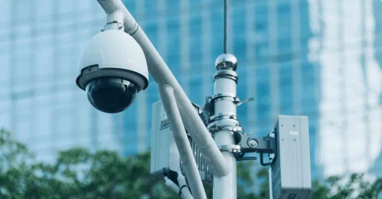 UPS for Smart CCTV camera which is black and white colored on the road