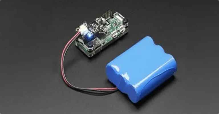 The Blue colored battery pack is connected with IoT device UPS to power supply